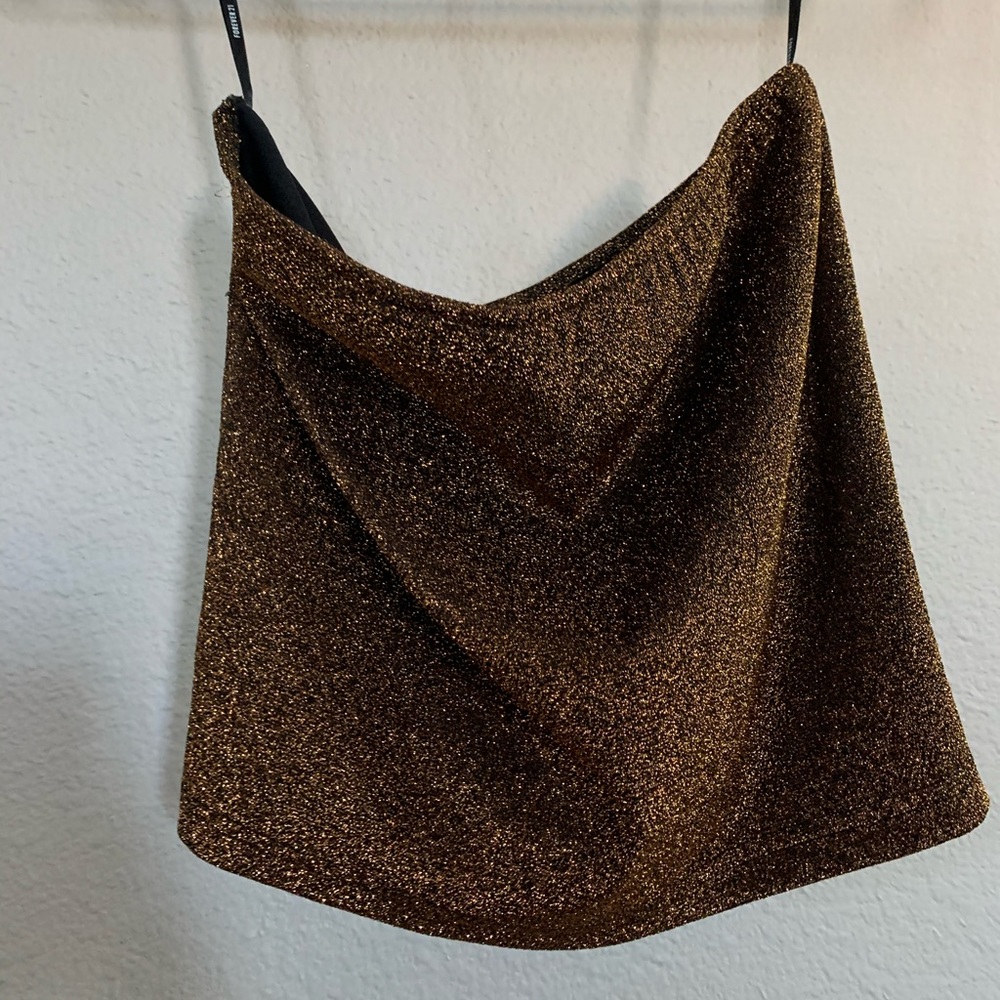 Gold sparkled tube top.